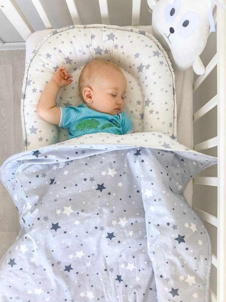 Использование гнездышка для новорожденного: для чего нужна подушка-кокон