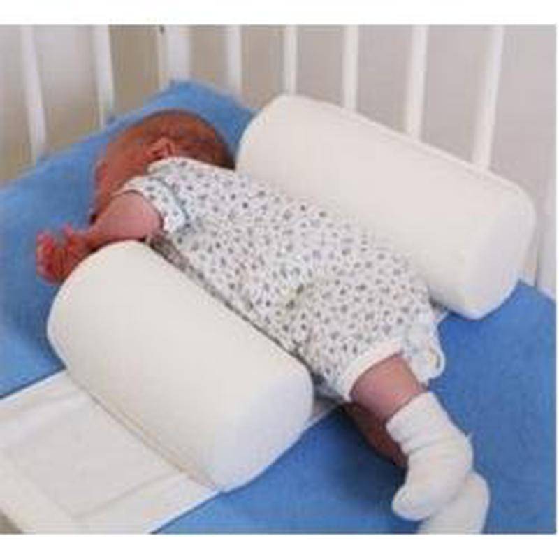 Позиционер для сна новорожденного: назначение, изготовление своими руками